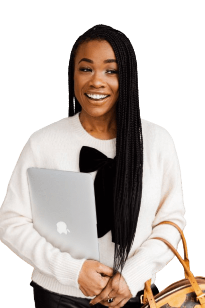 Smiling woman holding a laptop, dressed in a white sweater.